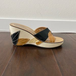 Indigo wedge heels with embroidered heel.